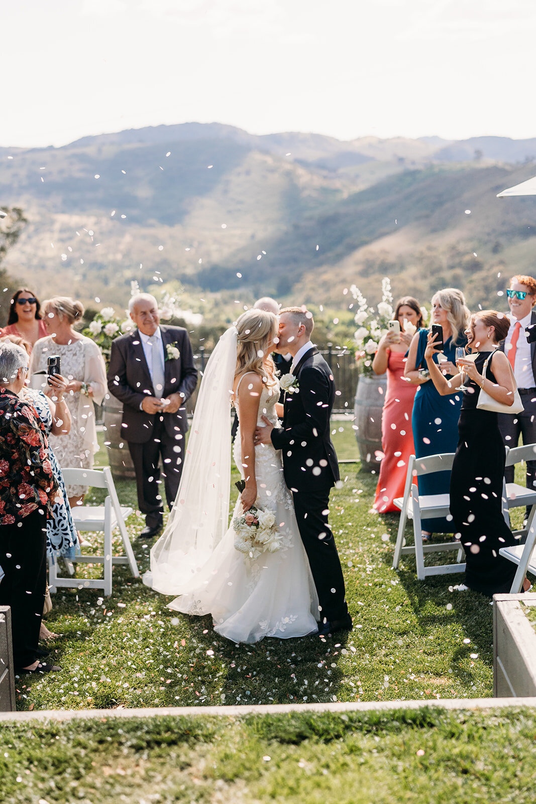A confetti kiss down the aisle at Brindabella Hills Winery