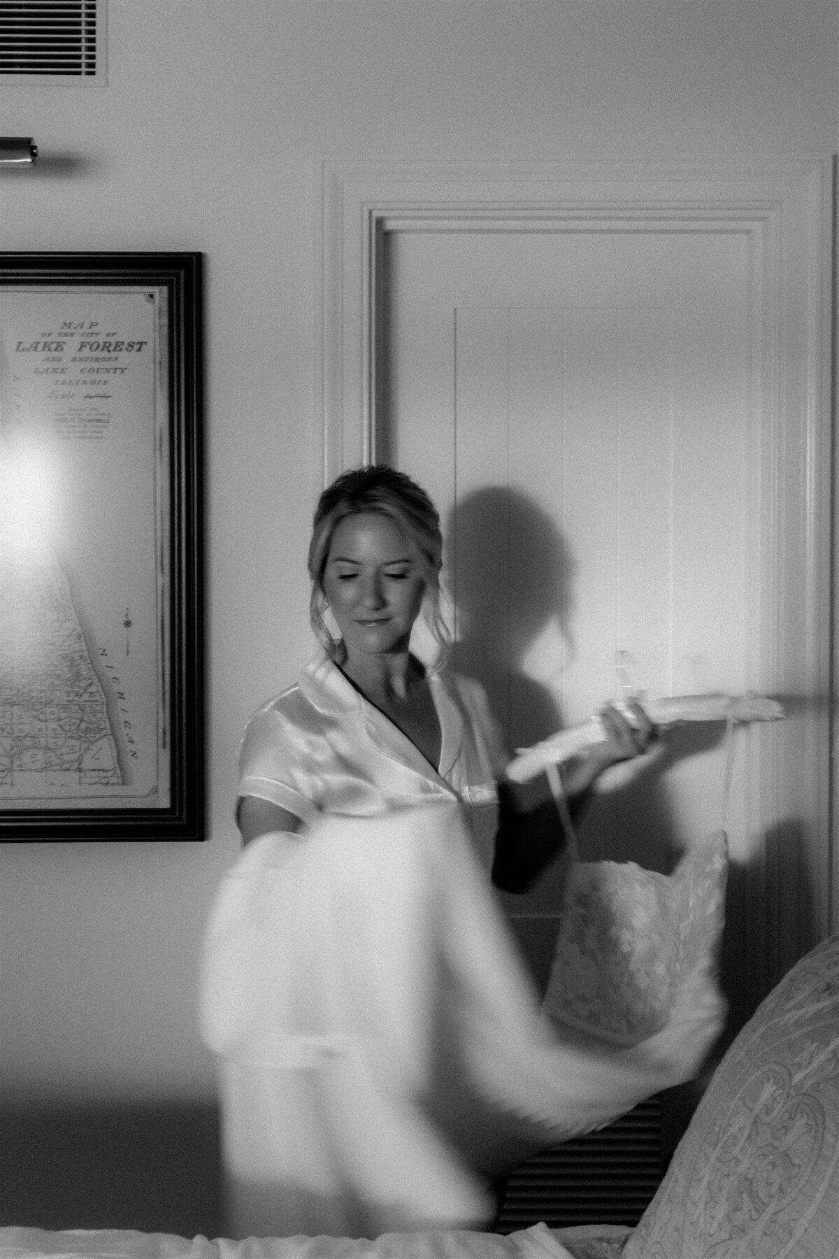 Bride-gets-dressed-into-gown