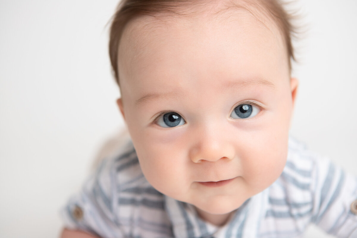Close up baby boy studio portrait