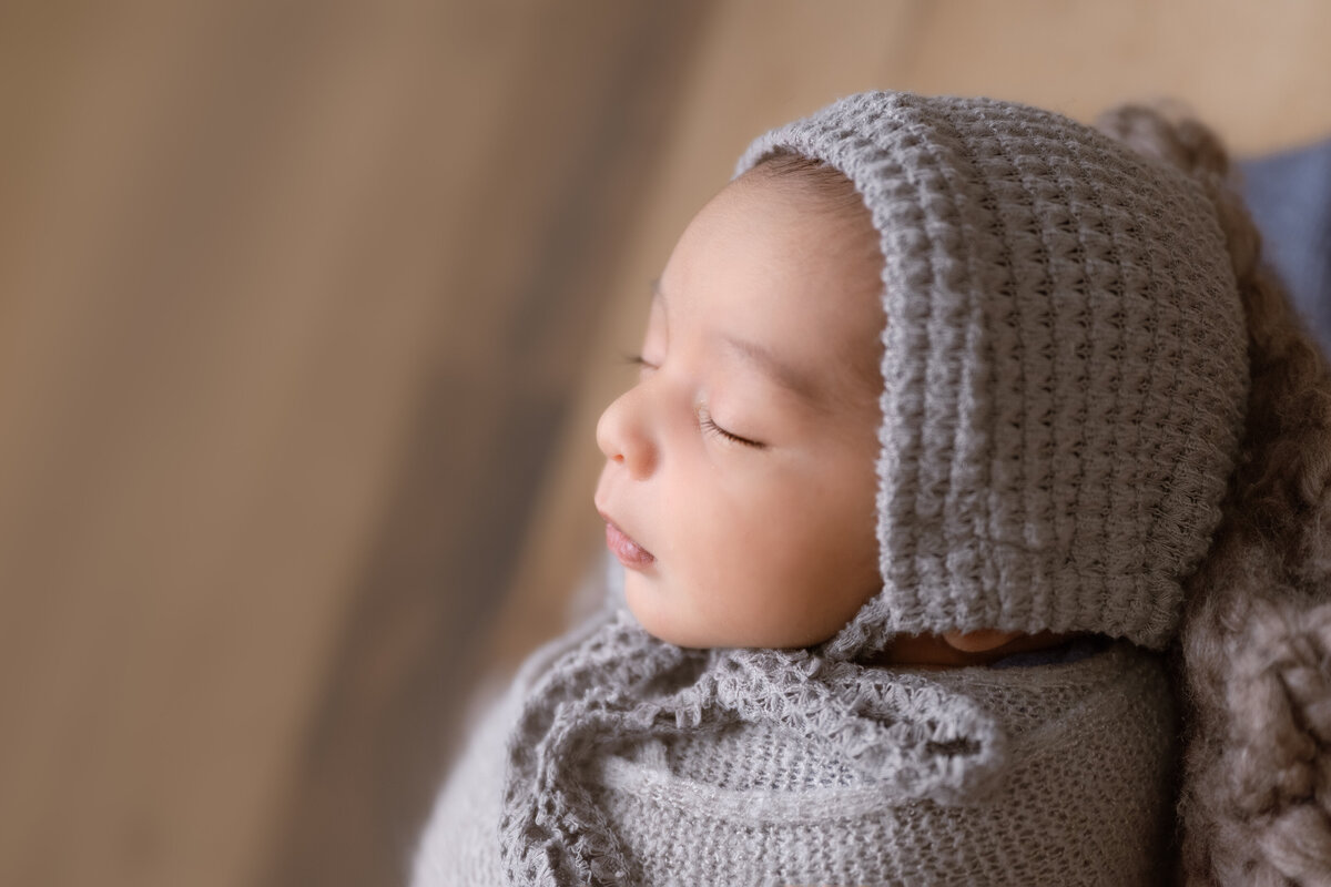 Edmonton Newborn Photography closeup baby in gray