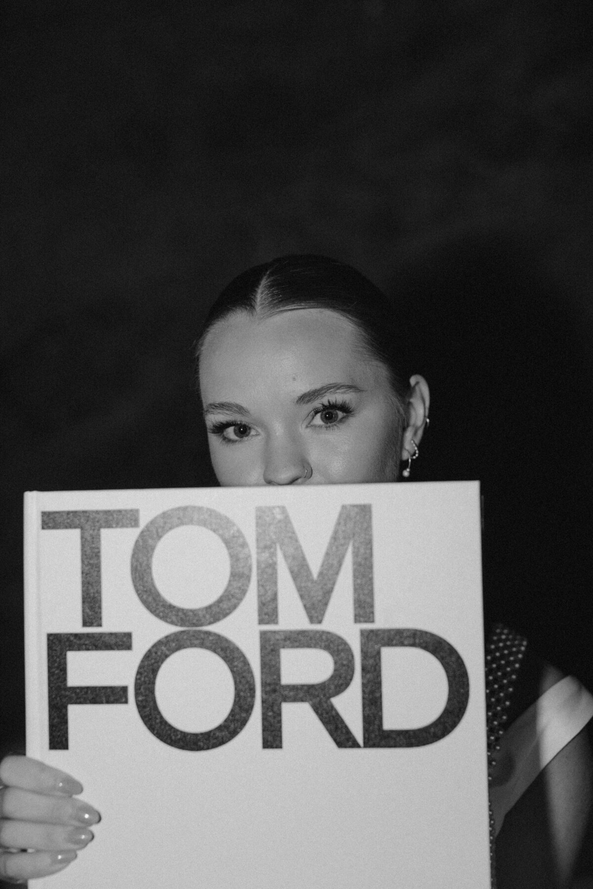 bride holding tom ford book