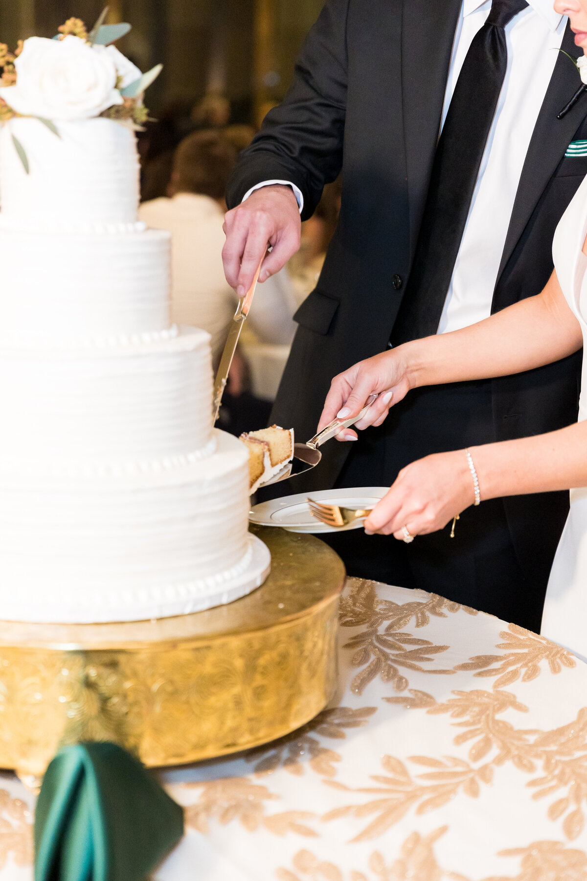 Bride and groom cutting wedding cake at Tennessee State Museum
