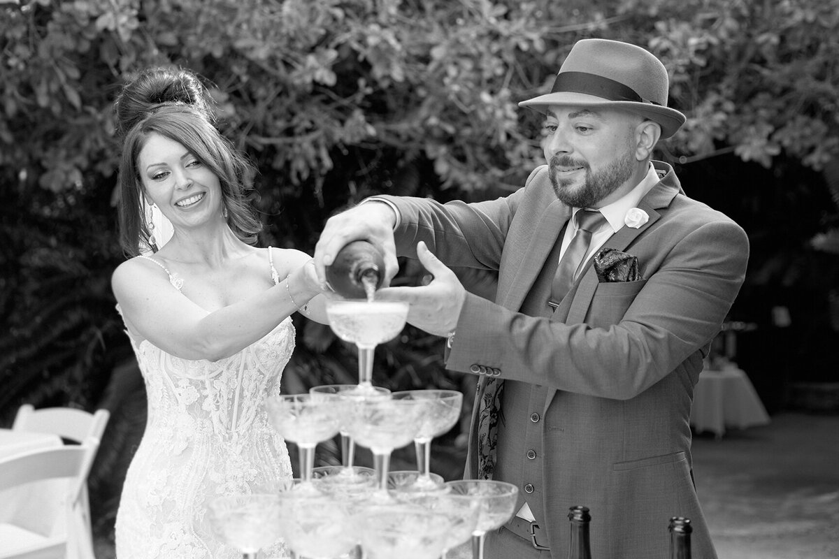 Capture timeless wedding memories at Villa Botanica, complete with a sparkling champagne tower.