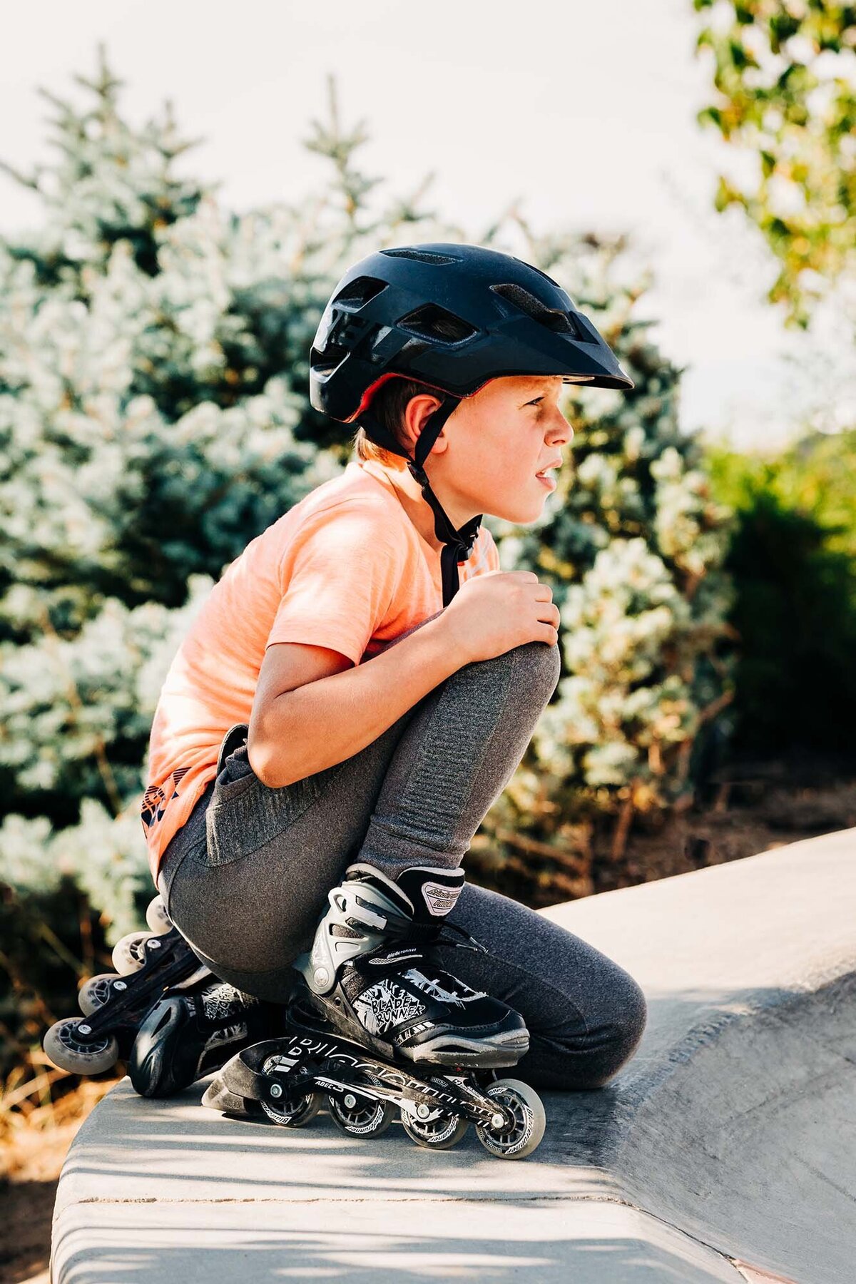 Little boy with inline skates at Mobash Skate Park