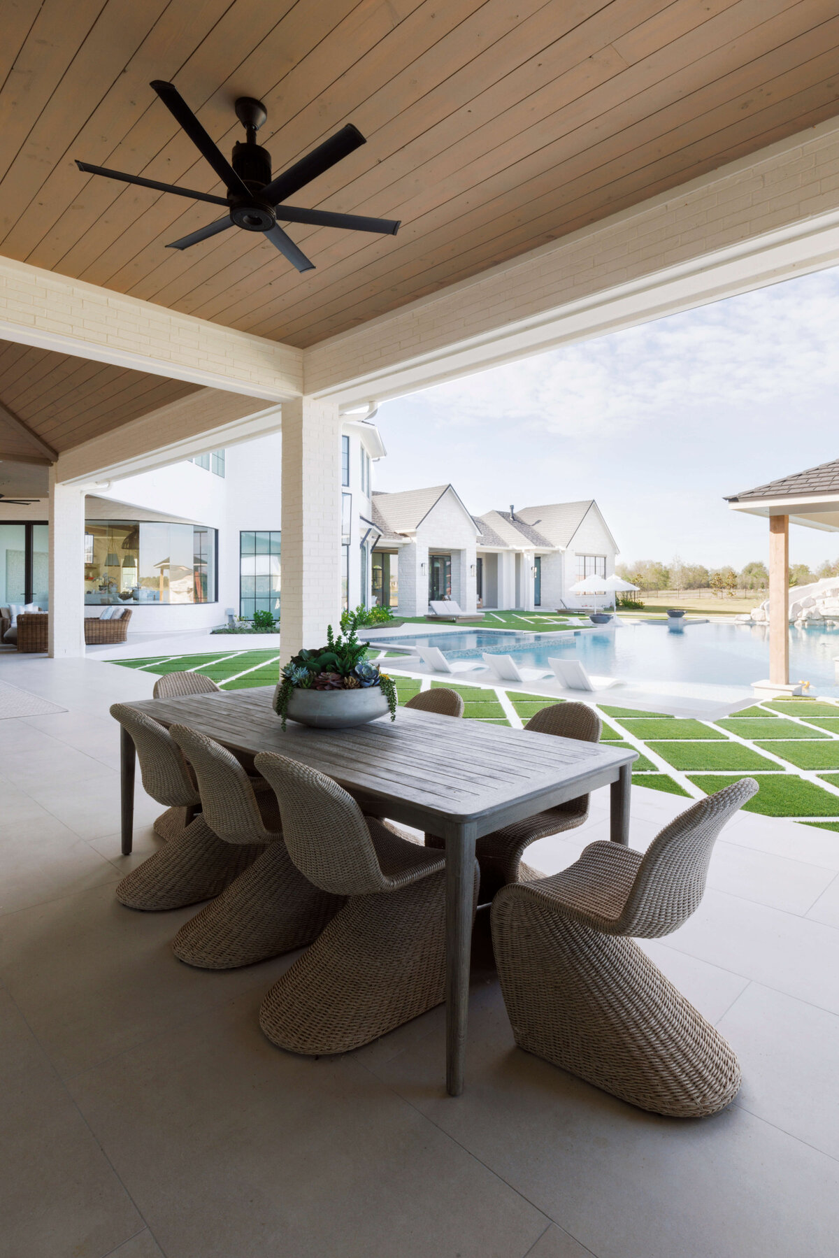 oyster creek studios hughes outdoor ding area overlooking pool