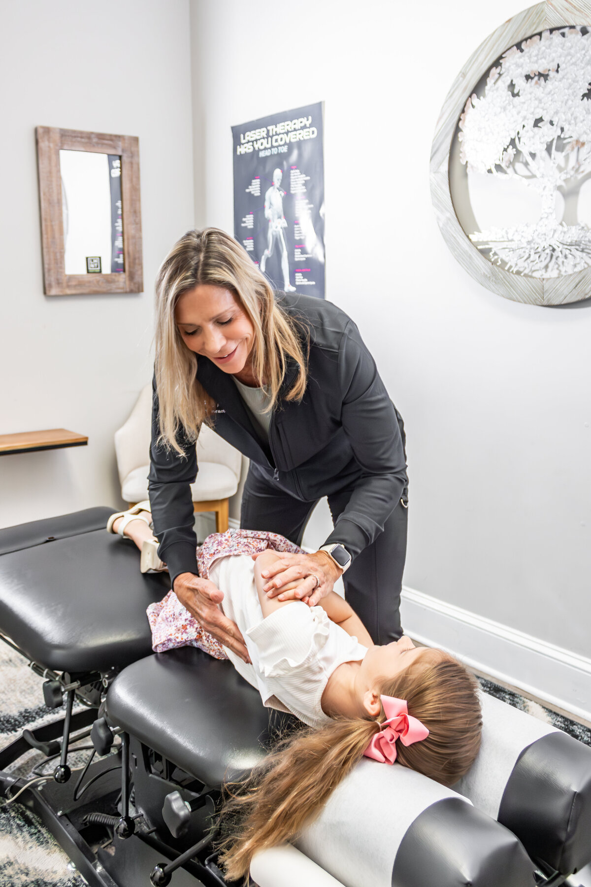 Dr. Tori performing an adjustment