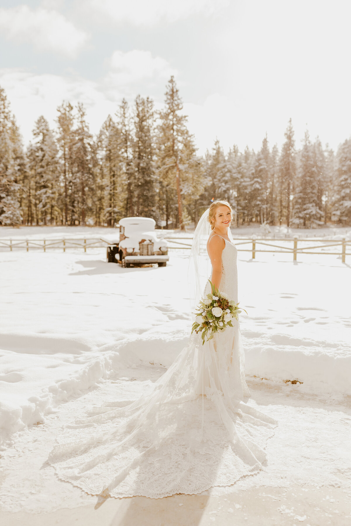 bride posing in snow