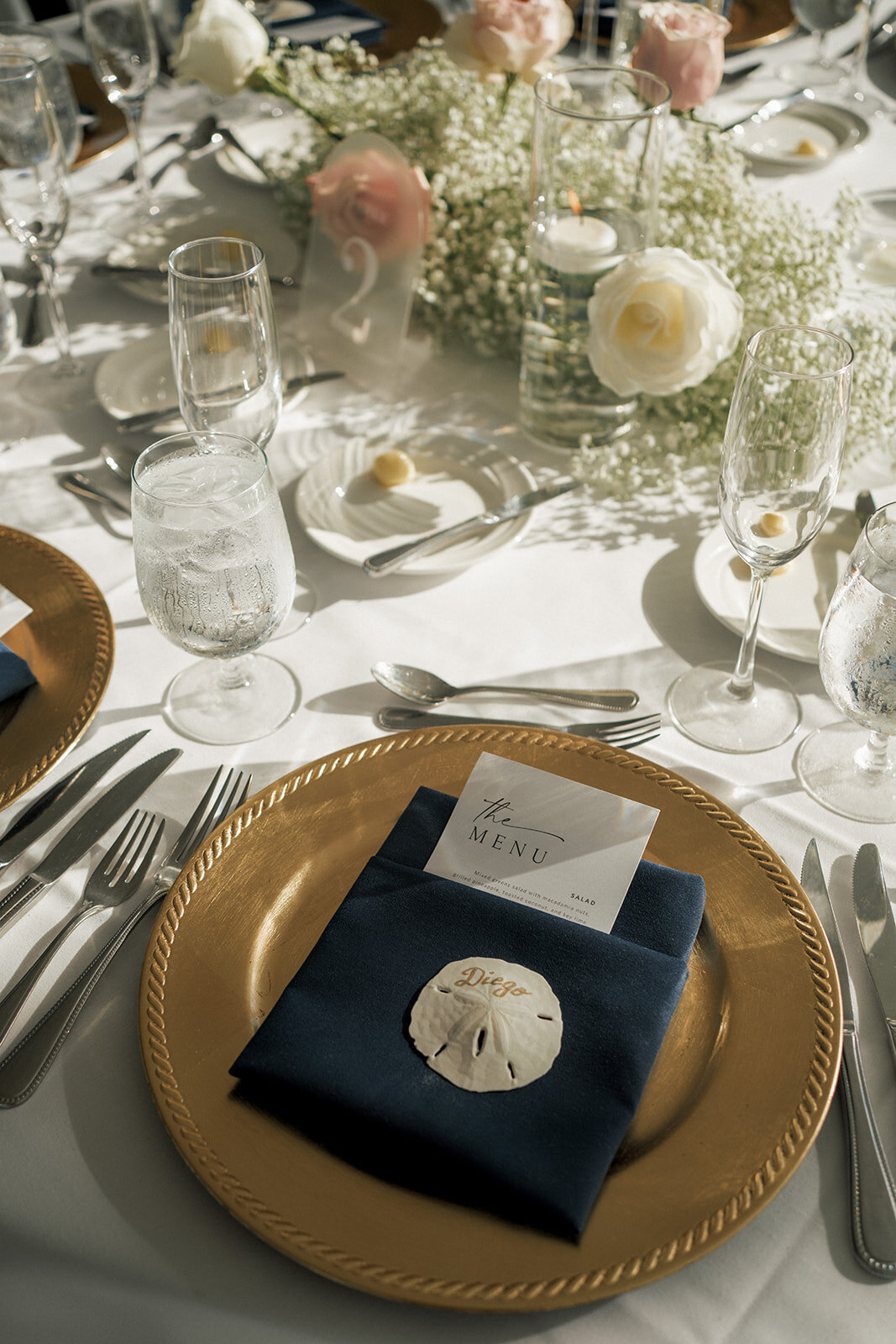 reception formal place setting gold plate sand dollar menu