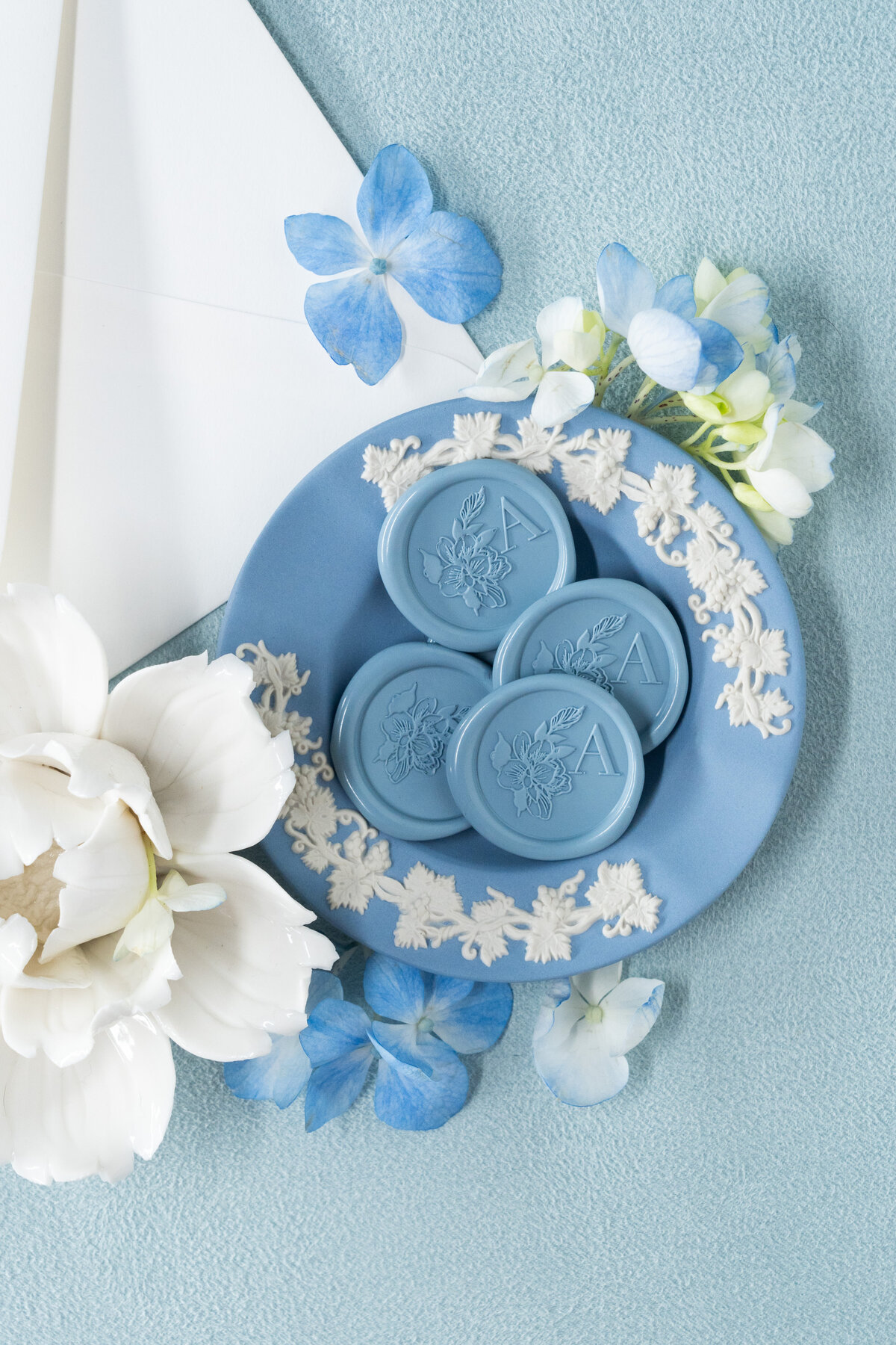 dusty-blue-wax-seals-custom-wedding-invitations