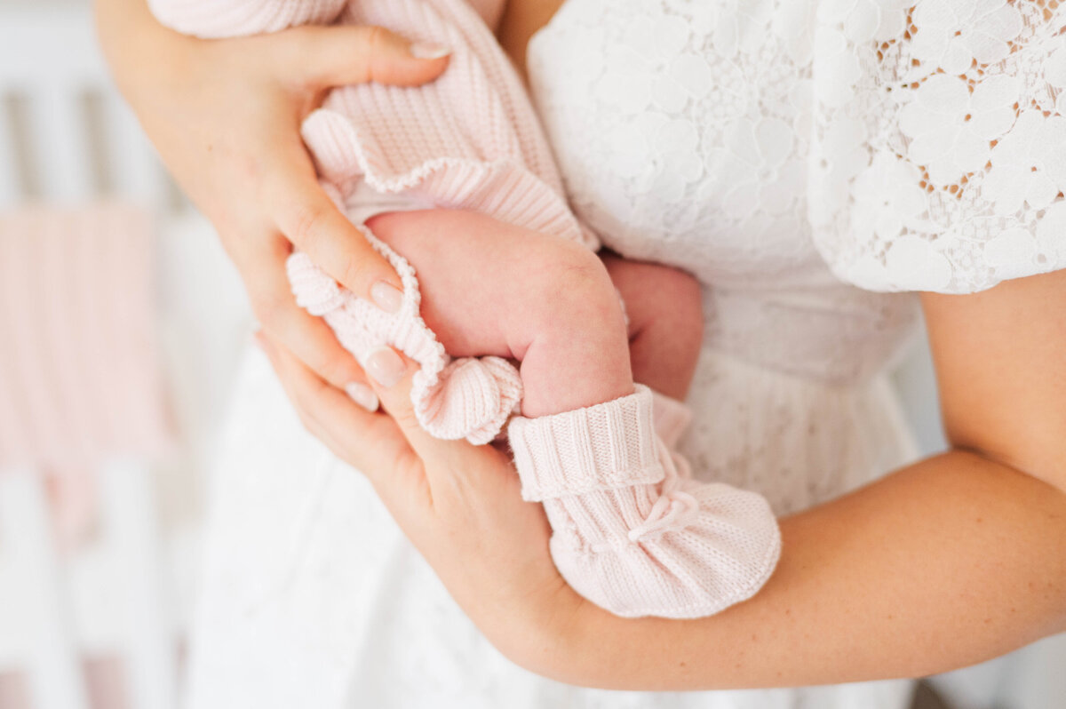 newborn girl booties taken in Douglas, MA by the best newborn photographer in central Massachsuetts