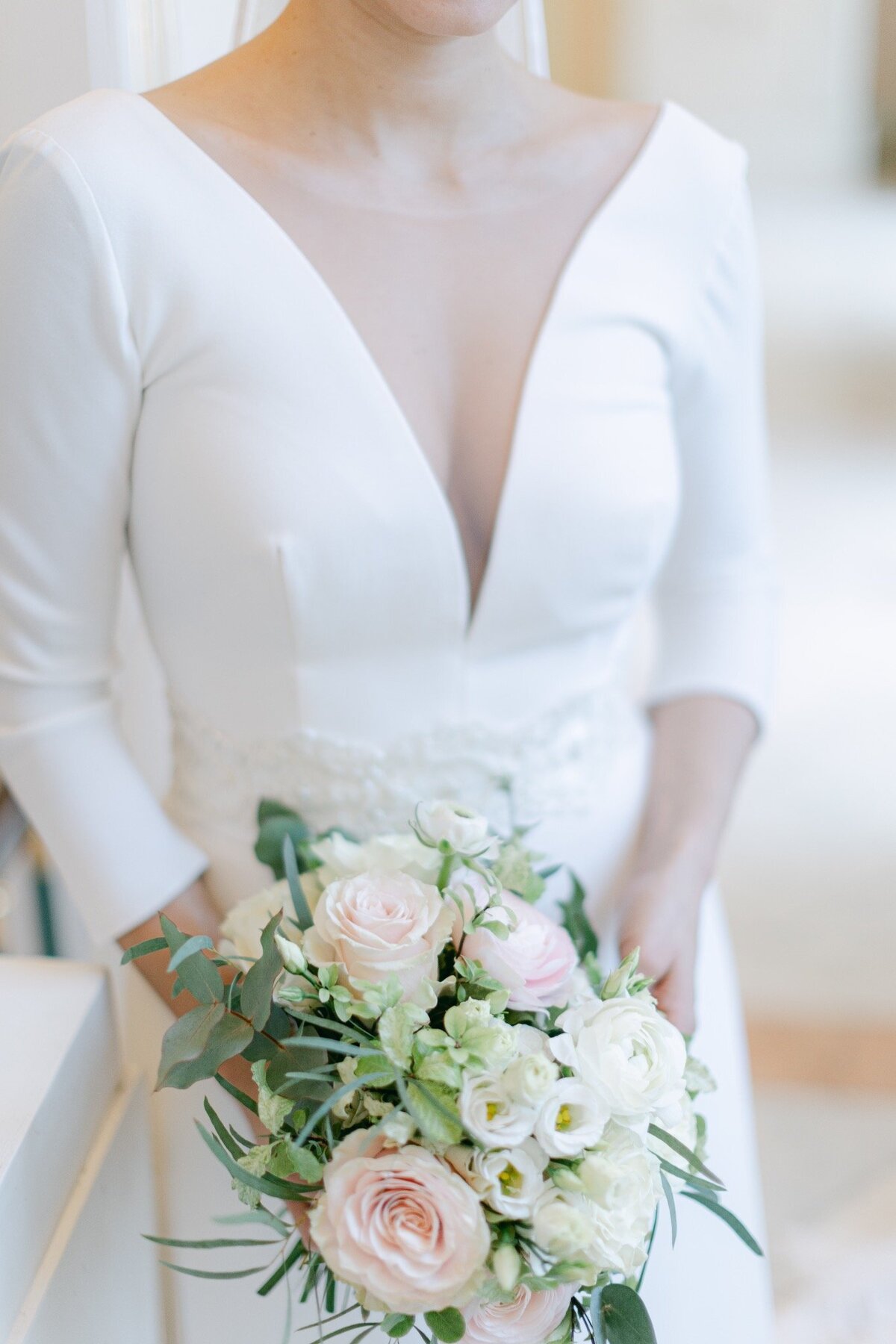 Detail of bridal bouquet minutes before walking down the aisle at palace Albertina in Vienna