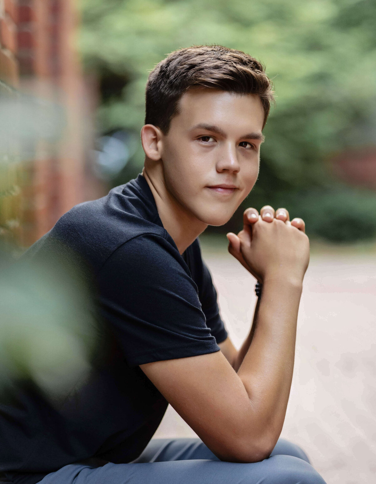 Senior portrait of a guy in downtown Erie Pa