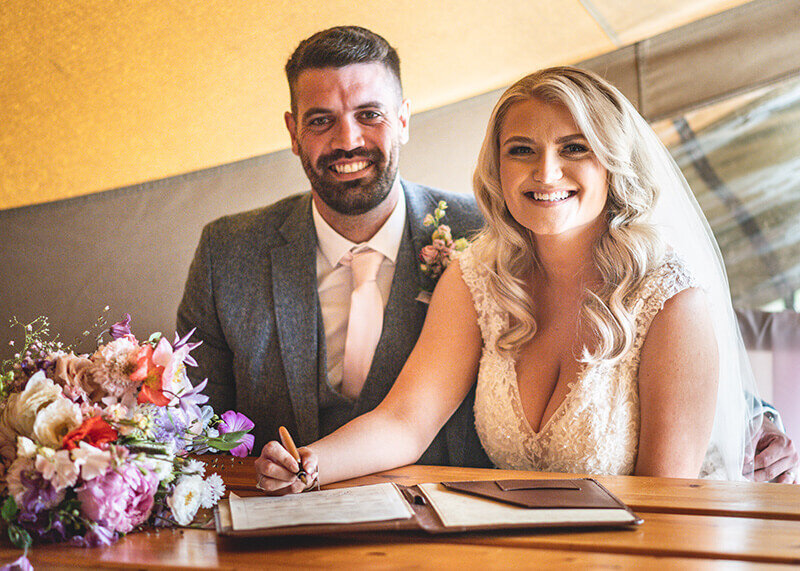 Married couple signing 169