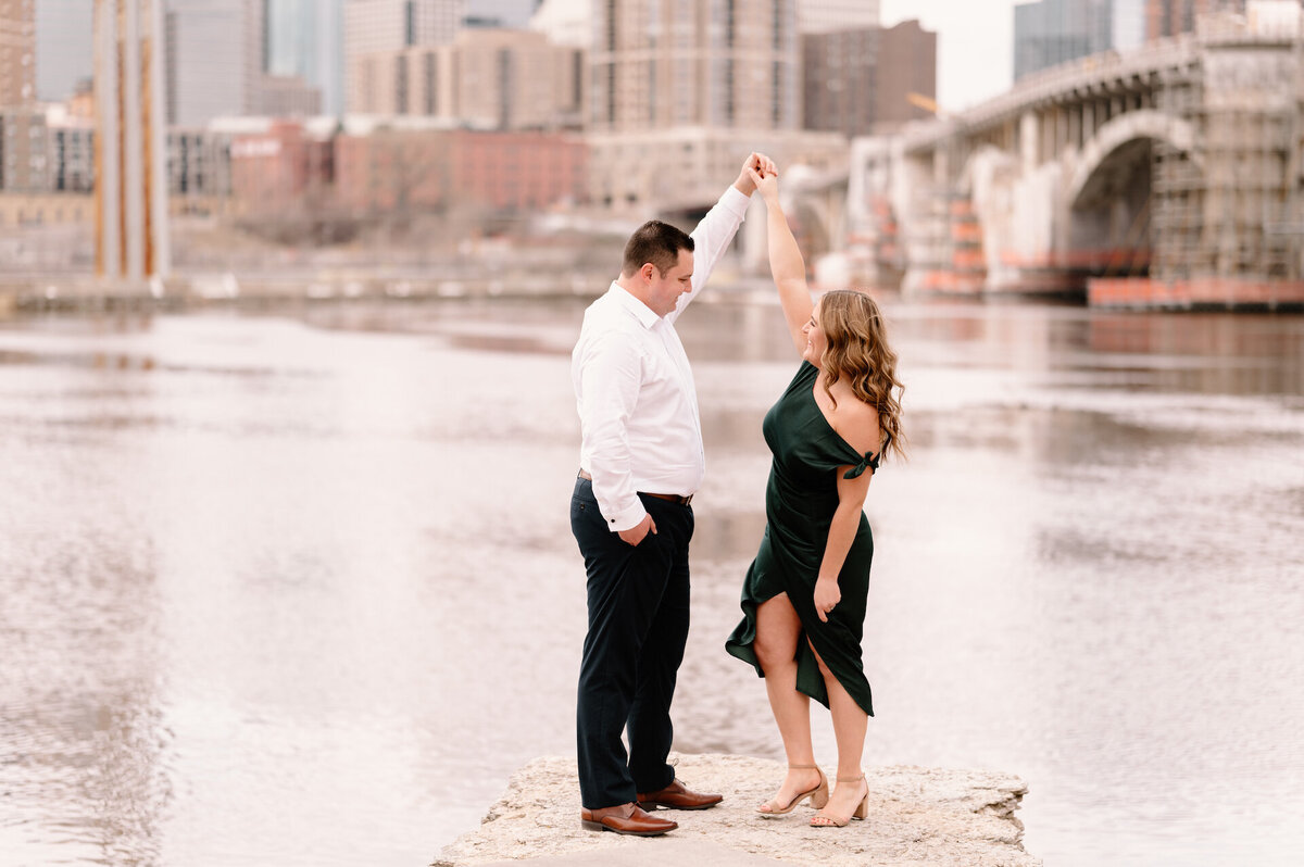 engaged couple dancing