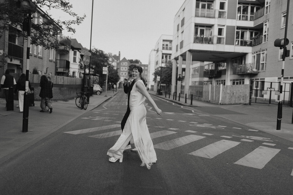 bride and groom walking in the streets