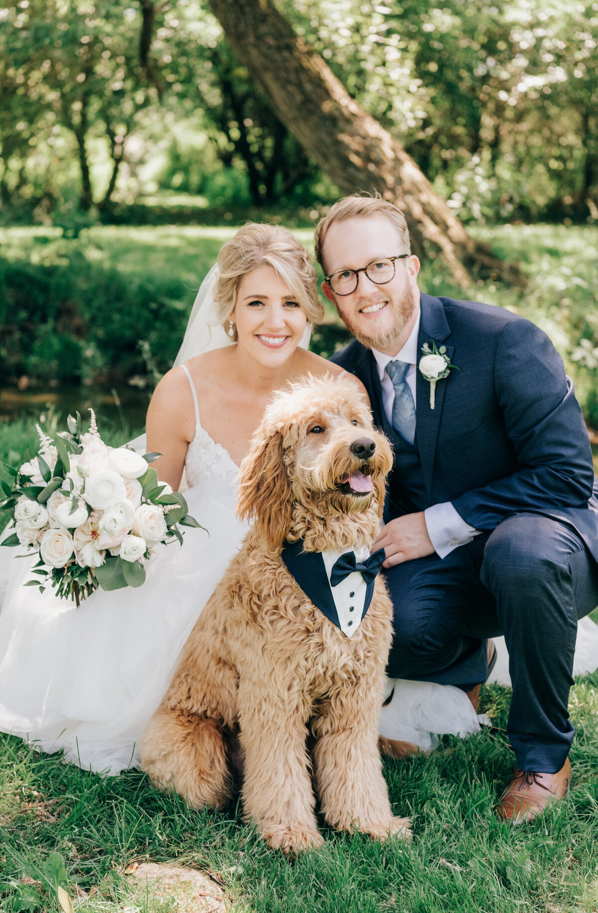 Dog dressed in tuxedo for bride and groom wedding portraits photographed by Nova Markina