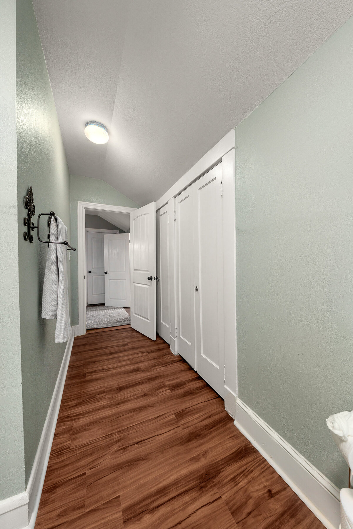 Spacious bathroom with additional storage space in this five-bedroom, 4-bathroom pet-friendly vacation rental house for 12 guests with free wifi, free parking, hot tub, mother-in-law suite, King beds and updated kitchen in downtown Waco, TX.
