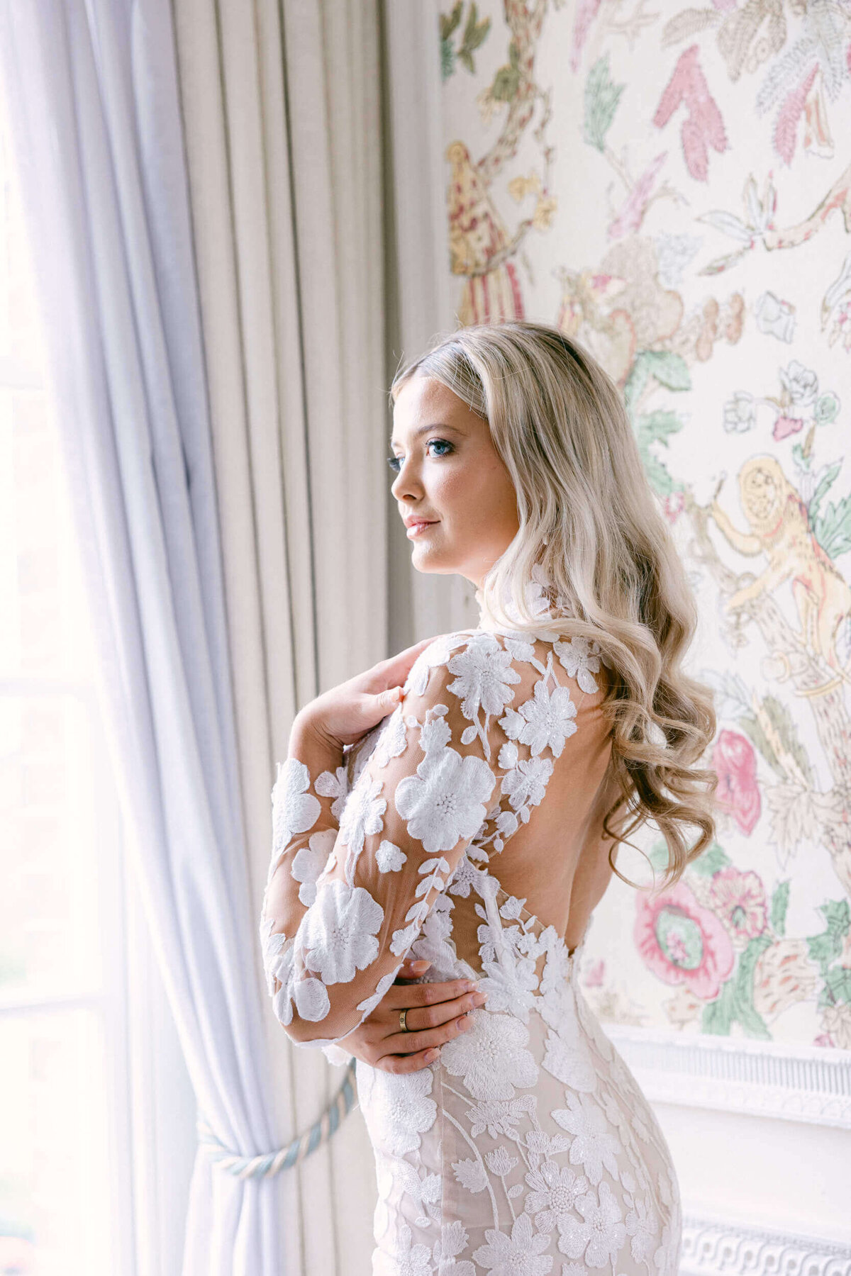 A wedding day portrait of the bride in her white wedding dress at Hedsor House in the UK