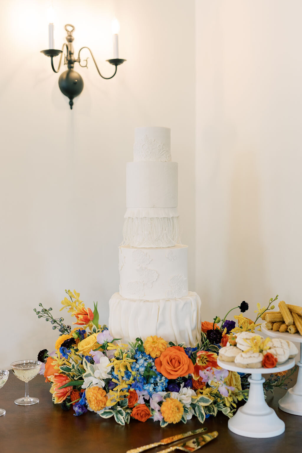 Bright florals around cake