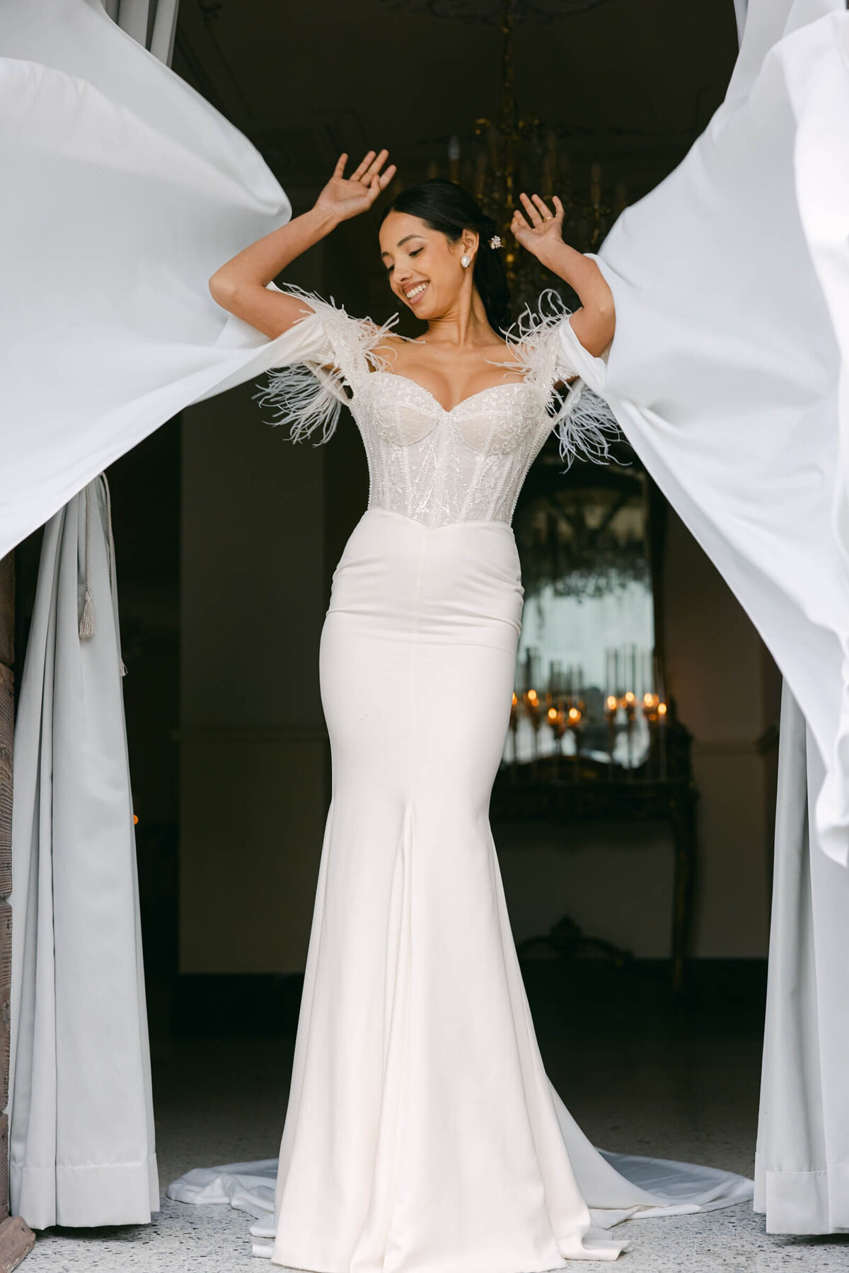 A wedding day bridal shot of a bride in her white dress at Villa Aura del Lago on lake como in Italy