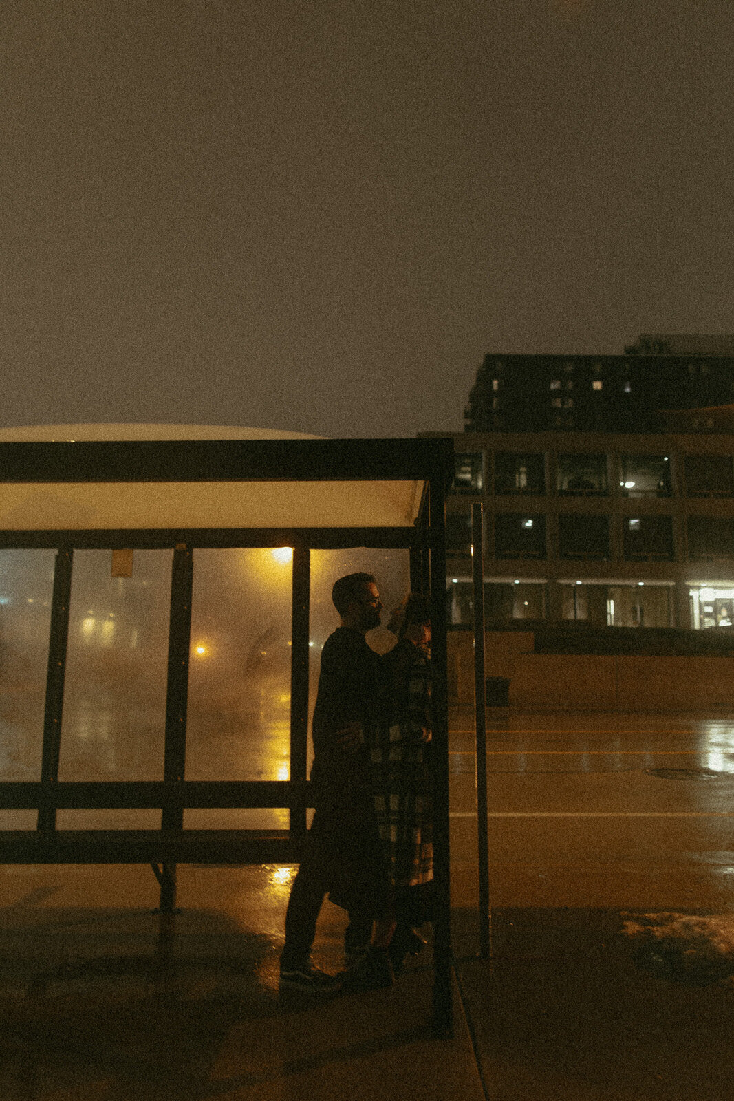 couples-rain-playful-night-session-downtown-moody-umbrella-film-illinois-47