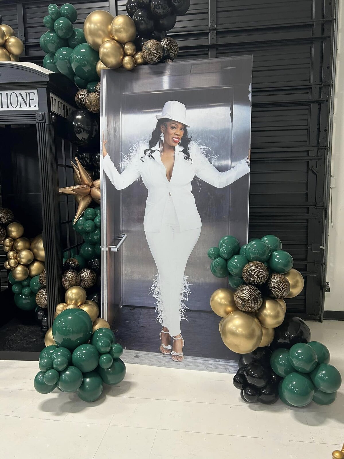 50th-birthday-party-photo-next-to-telephone-booth