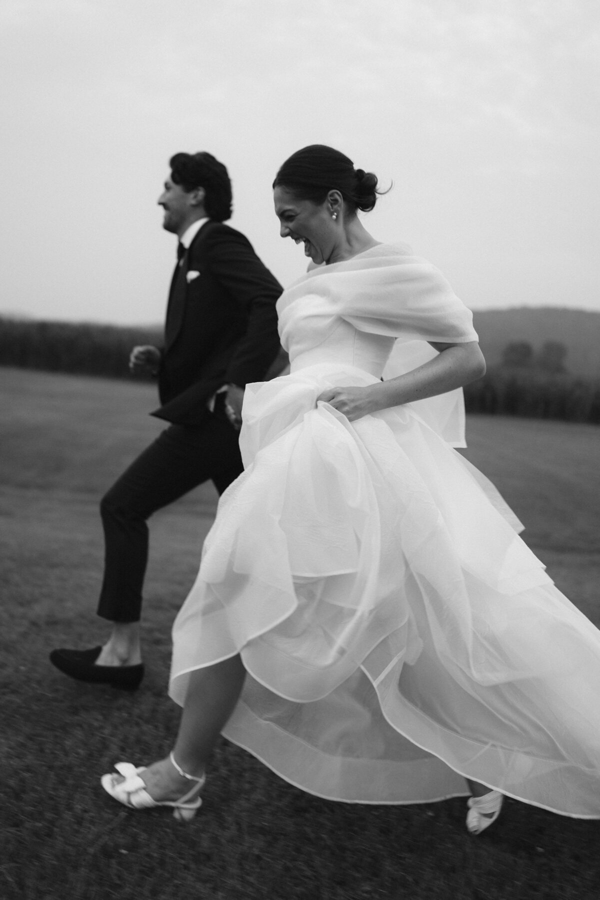 Elegant editorial wedding photography demonstrating sophisticated techniques
 at Lion Rock Farm venue. Lauren Alatriste's fashion forward approach to luxury wedding
documentation creates imagery that feels both magazine-worthy and genuinely celebratory.