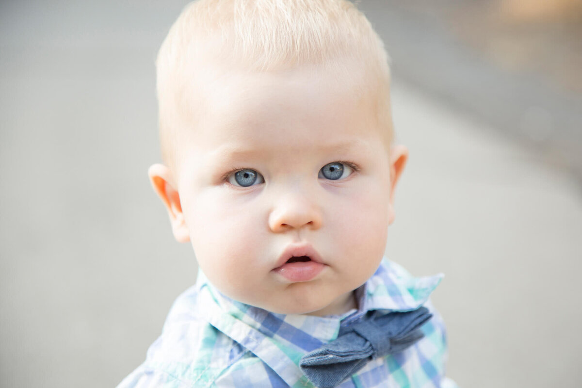 one year old boy on a park path by las vegas milestone photographer Jessica Bowles