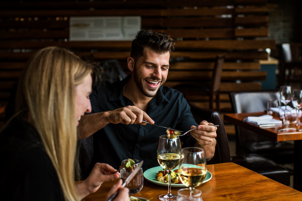 Couple enjoying lunch at the Juniper Bistro in Banff