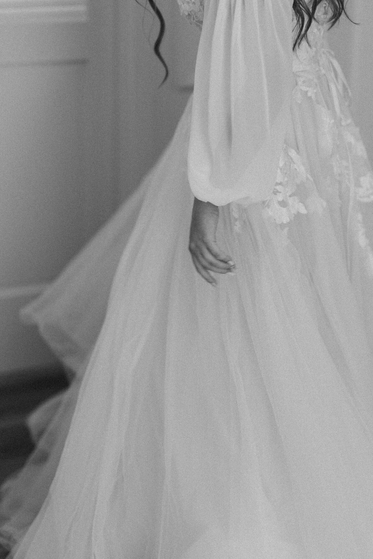 Bride in a tulle long sleeve gown