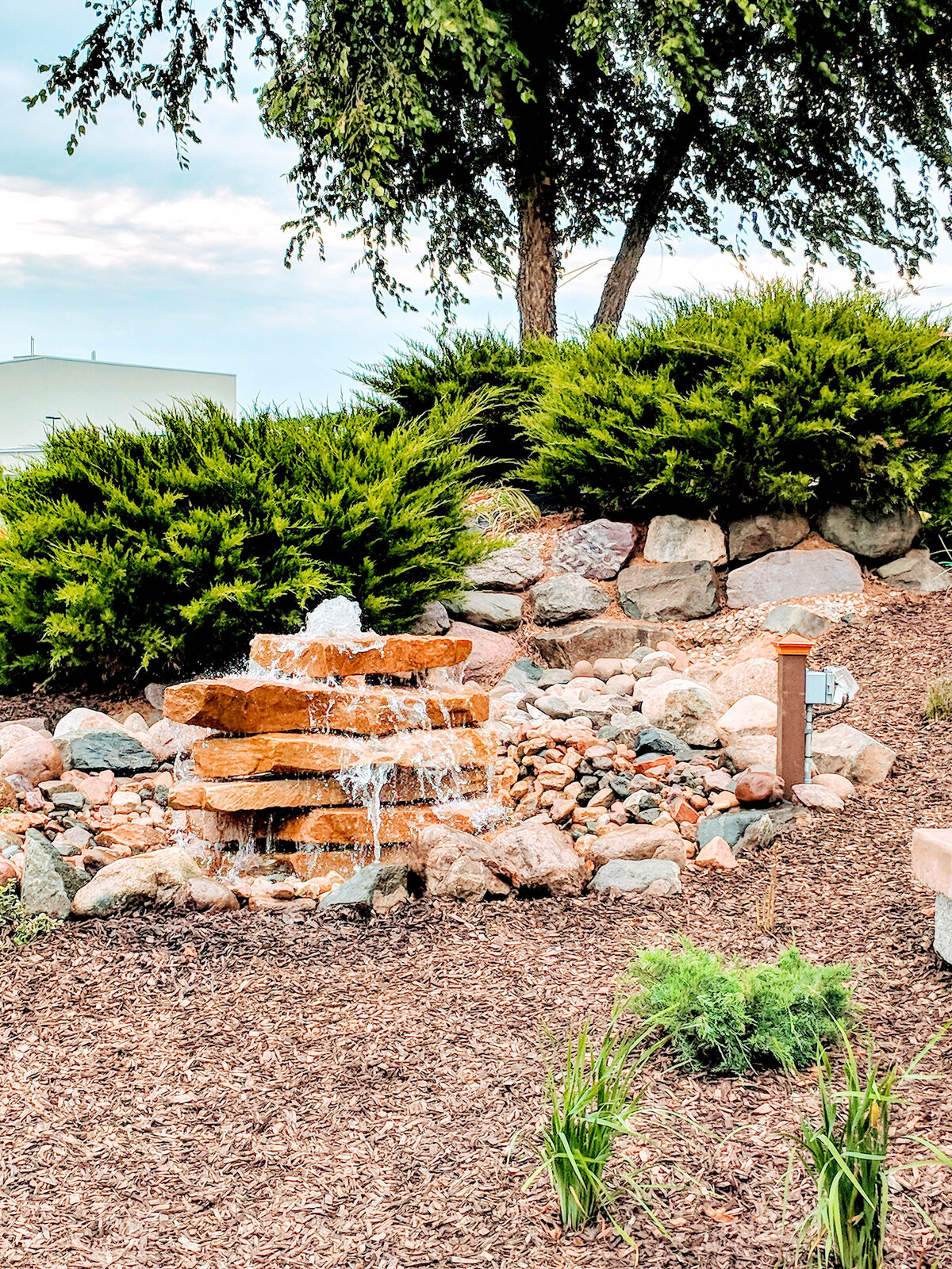 Custom Stacked Stone Fountain bubbling over rocks