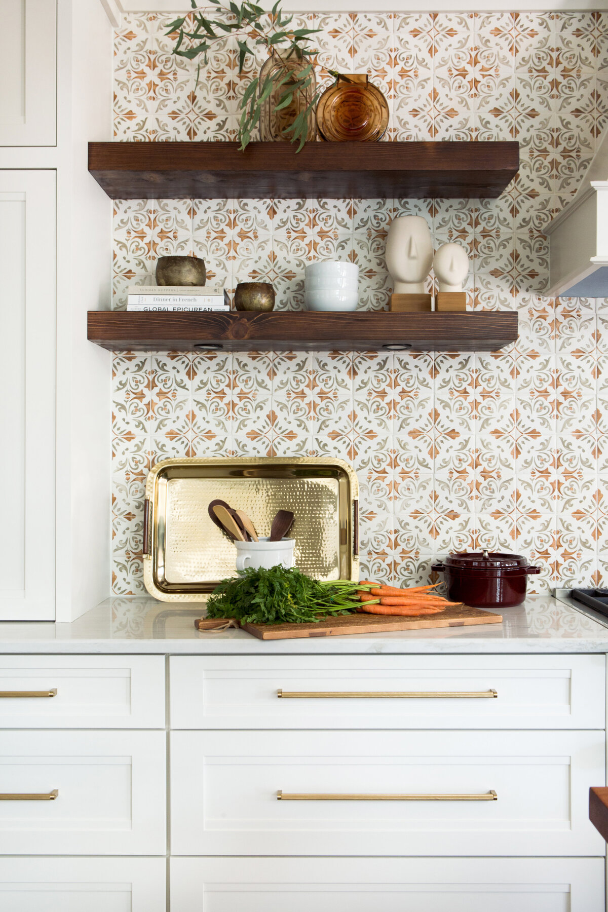 Chic kitchen in Lake Norman, NC, with curated shelf decor, neutral tones, and elegant details.