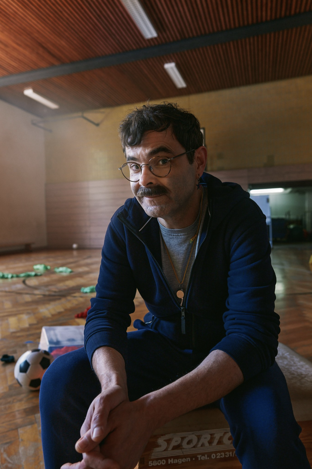 A portfolio still highlighting lens choice and stylized color.