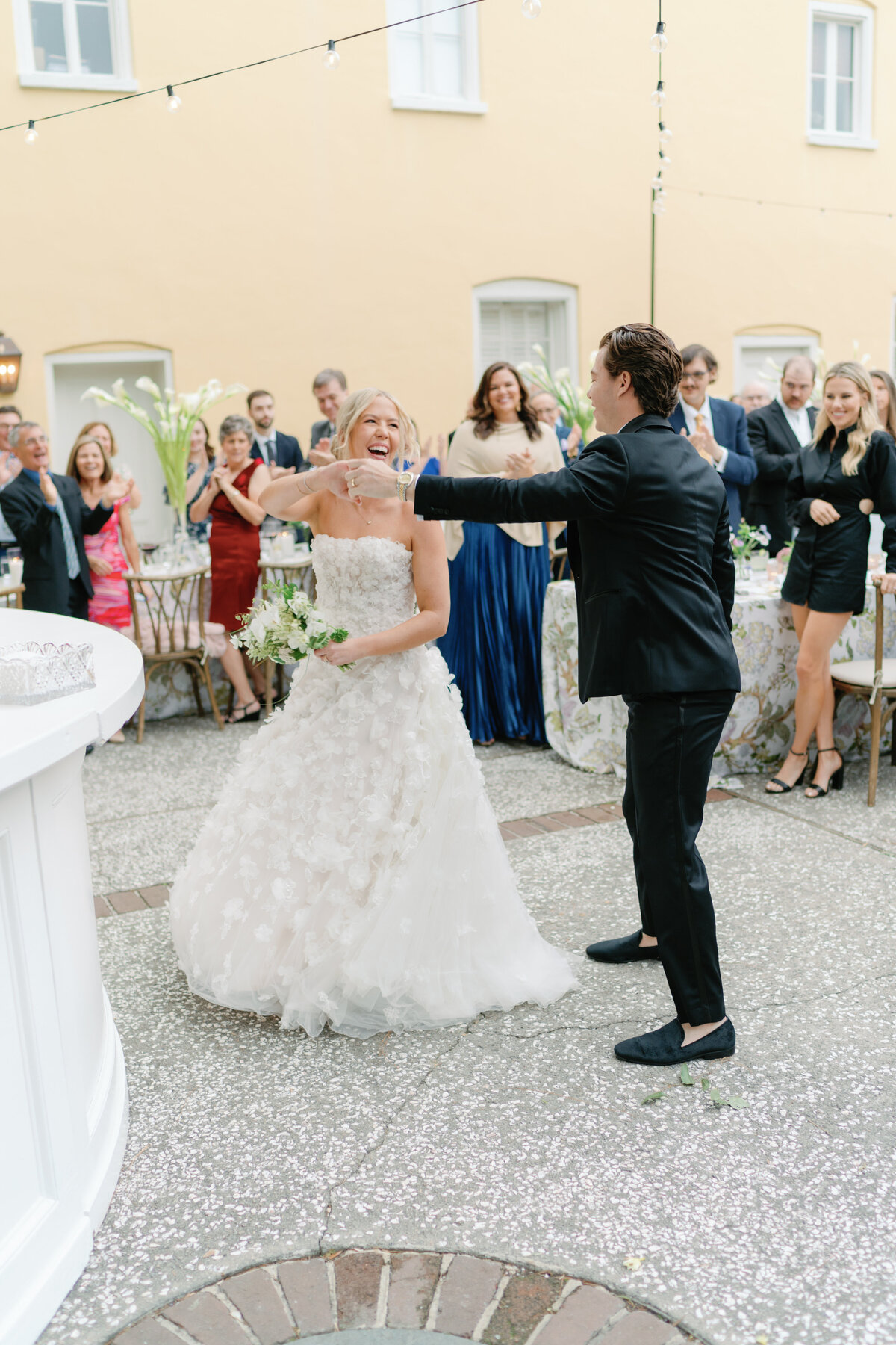 bride_groom_dancing_entrance_reception_details_william_aiken_house_outdoor_wedding_kailee_dimeglio_photography-1695
