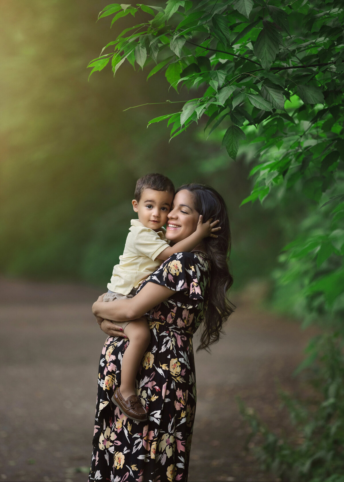 pregnant mom with child during maternity photography shoot by best nj photographer.