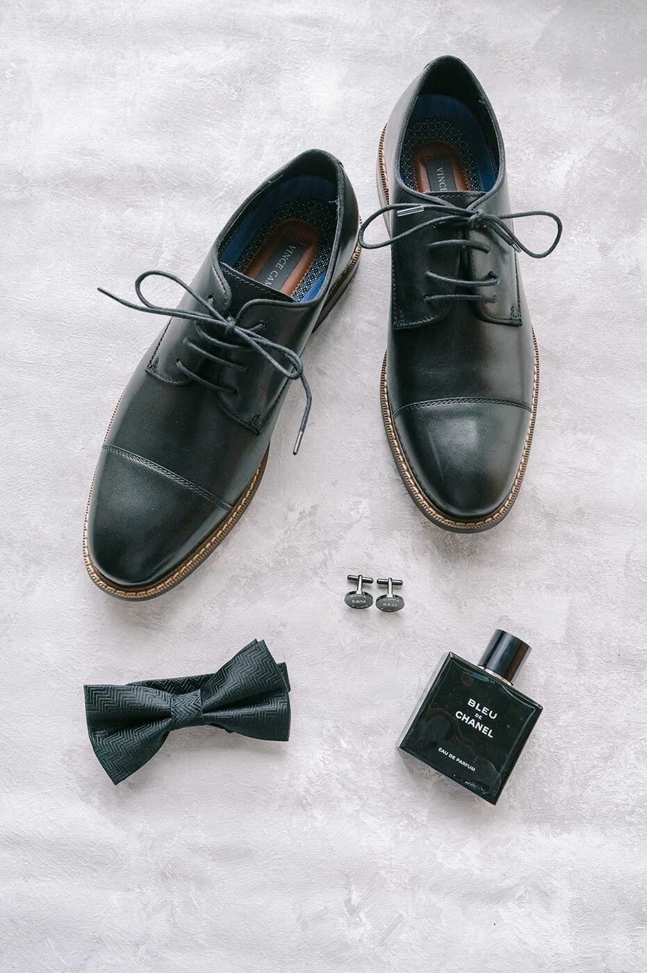 Wedding flatlay details of grooms shoes