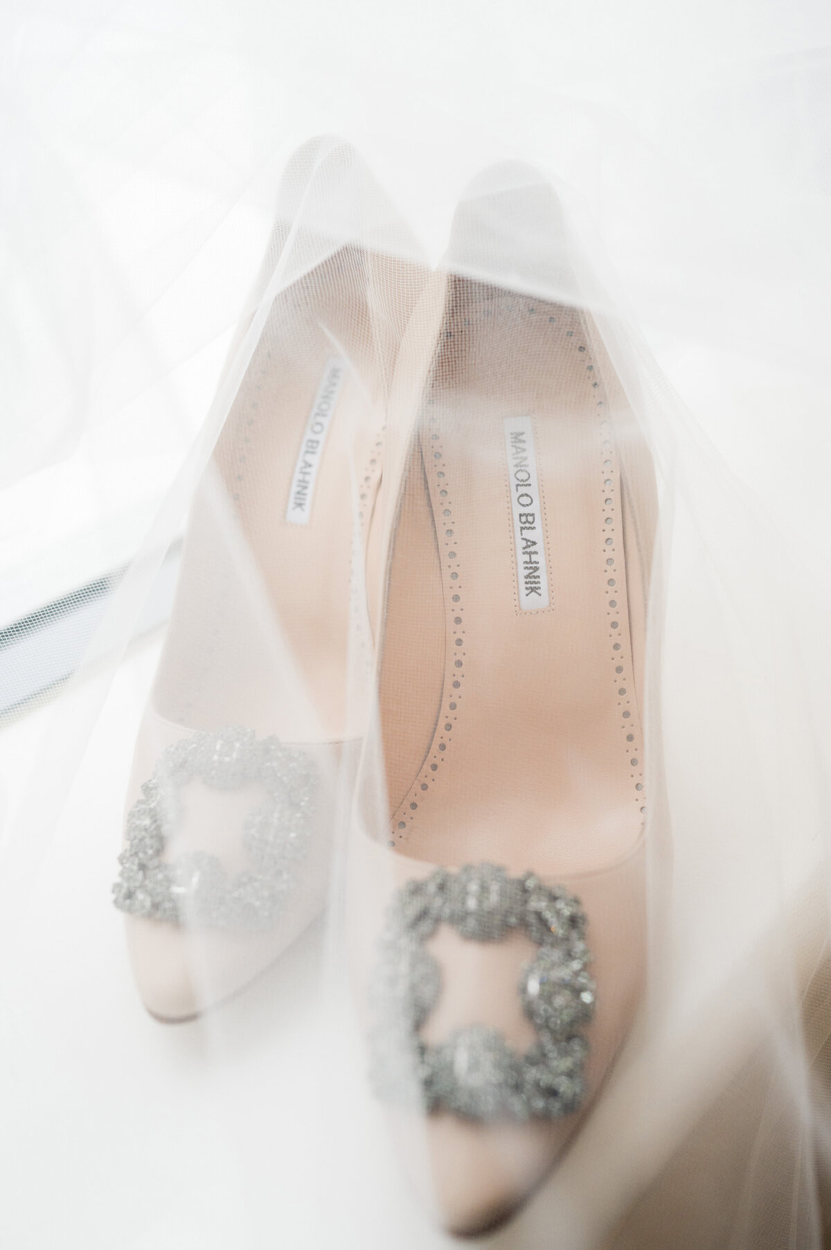 wedding shoes in window at hotel monaco