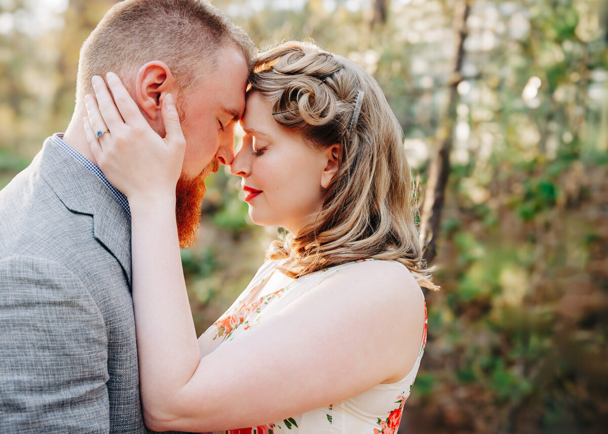 Engagement photo intimate moment taken at Lincolnwood Trailhead in Missoula, MT