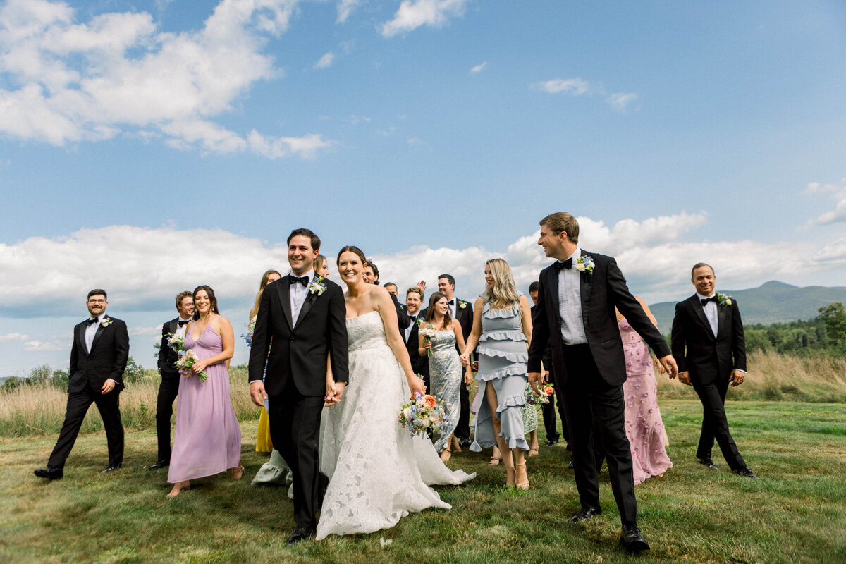 colorful bridal party walking