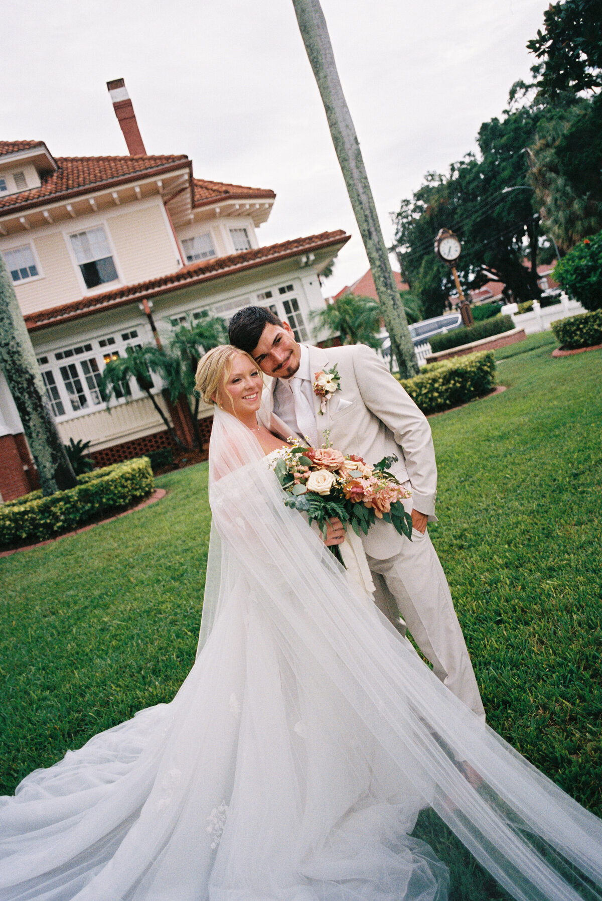 Vintage film photograph of a Tampa Florida photographer capturing a bride and groom.