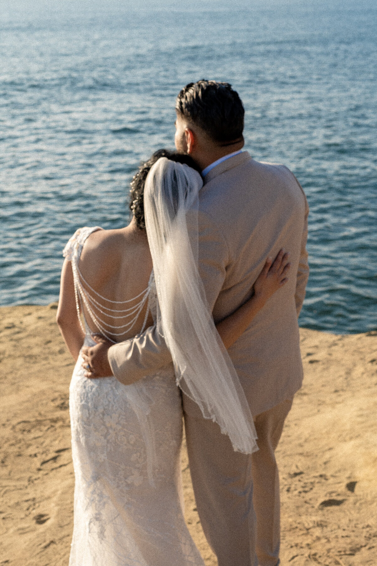 The newly happily married couple Sunset Cliffs San Diego