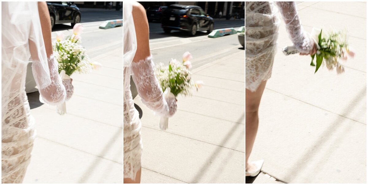 Bride with a white roses bouquet wearing a veil and a headband matching her bridal dress with sheer corset design and lace flower details in the GTA