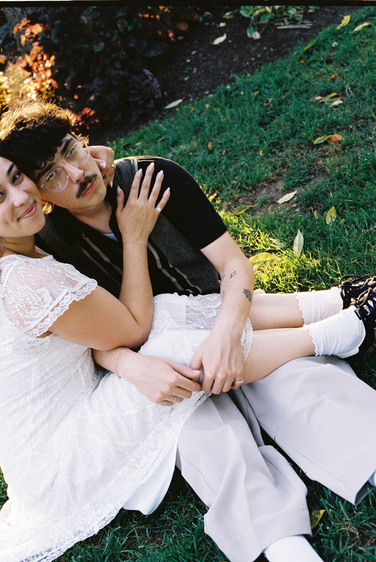 couple sitting in grass