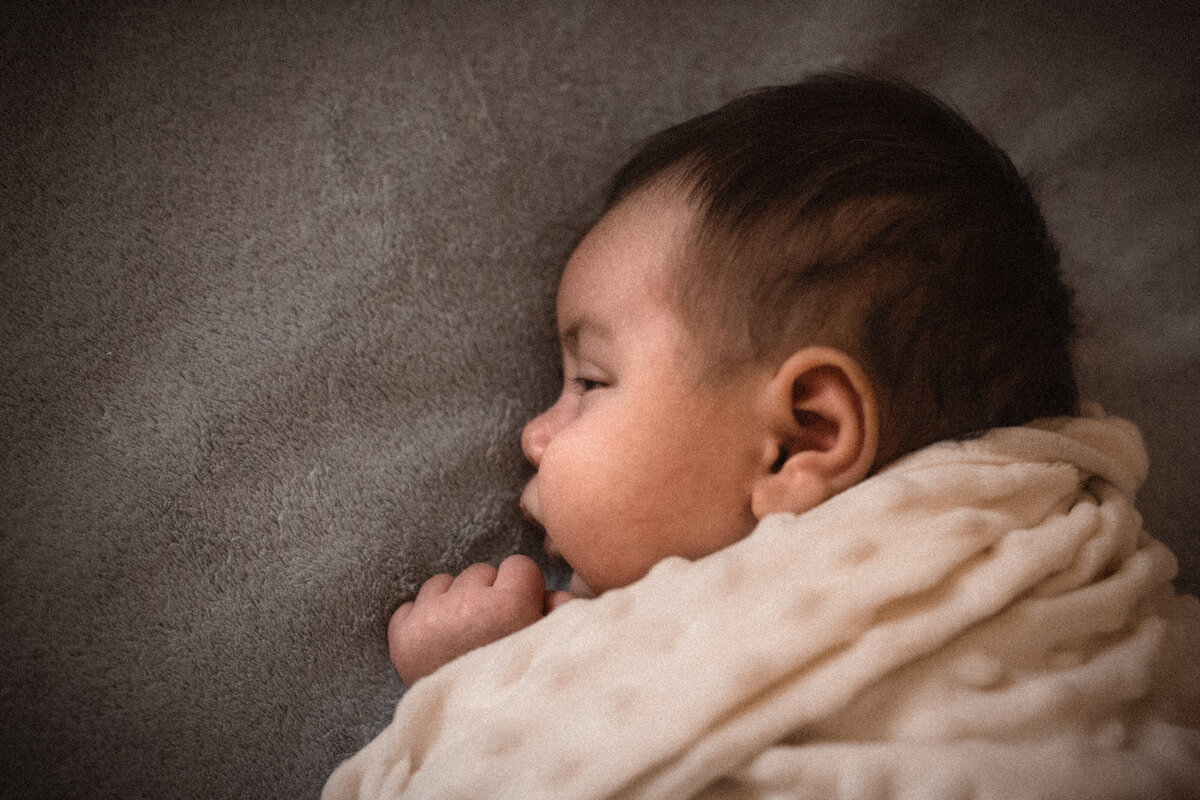 Newborn Baby under blanket