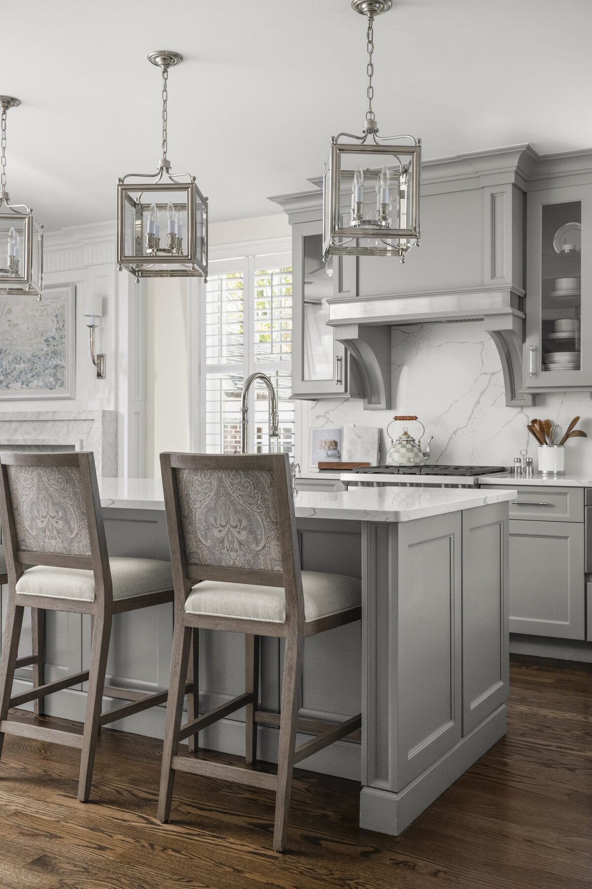 candra lynn interiors ocean port project kitchen with island pendents and barstools