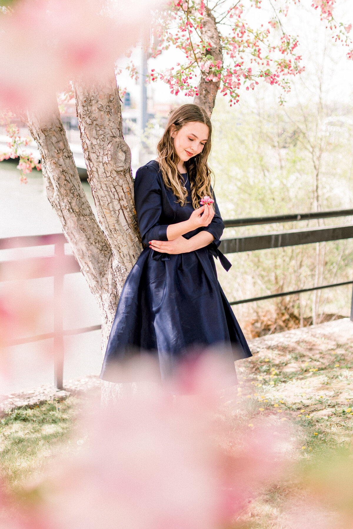 Austin Texas High school girl with casual outfit in the wildflowers for senior photos.