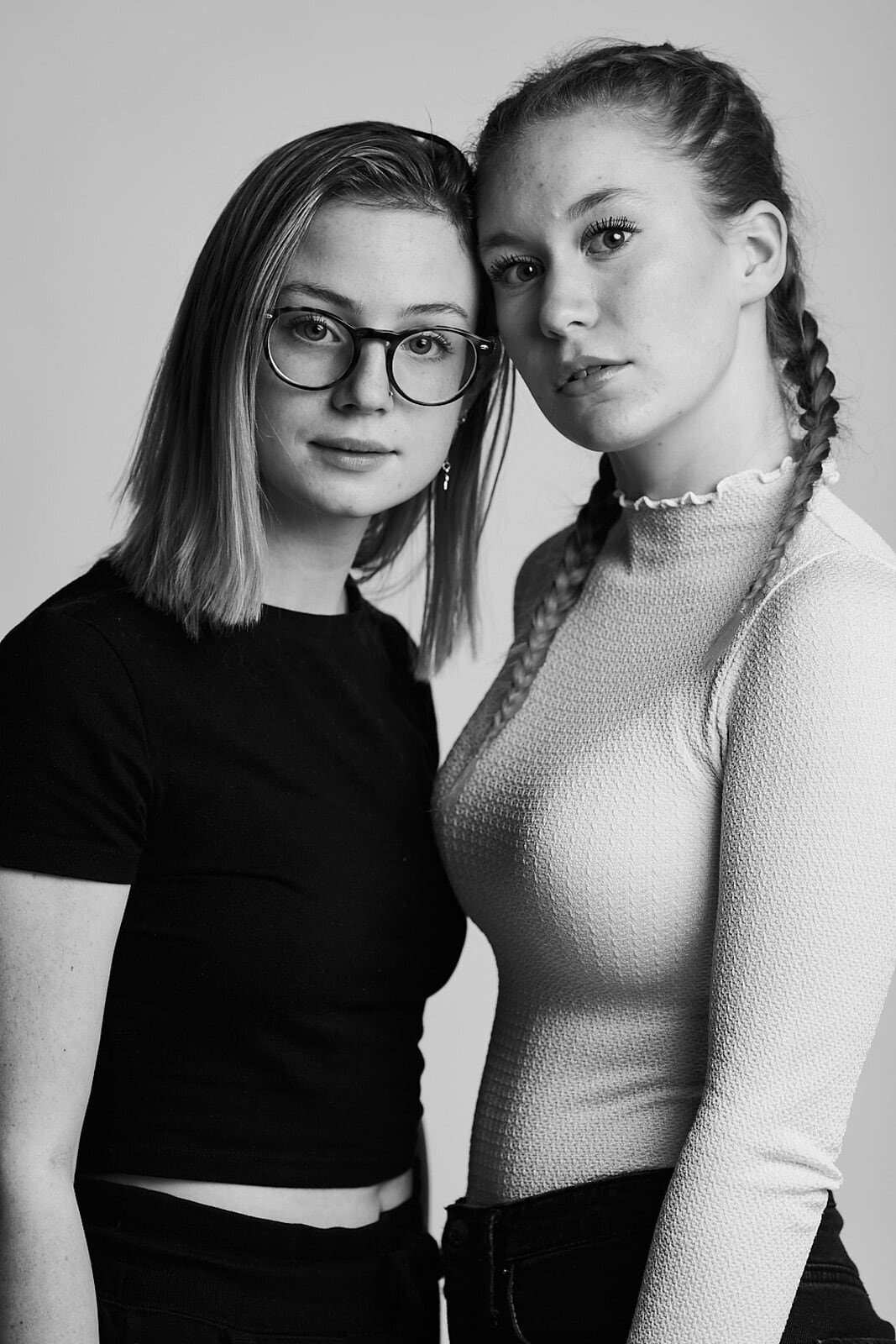 Black and White Portrait of Two Young Women in Thoughtful Pose-07