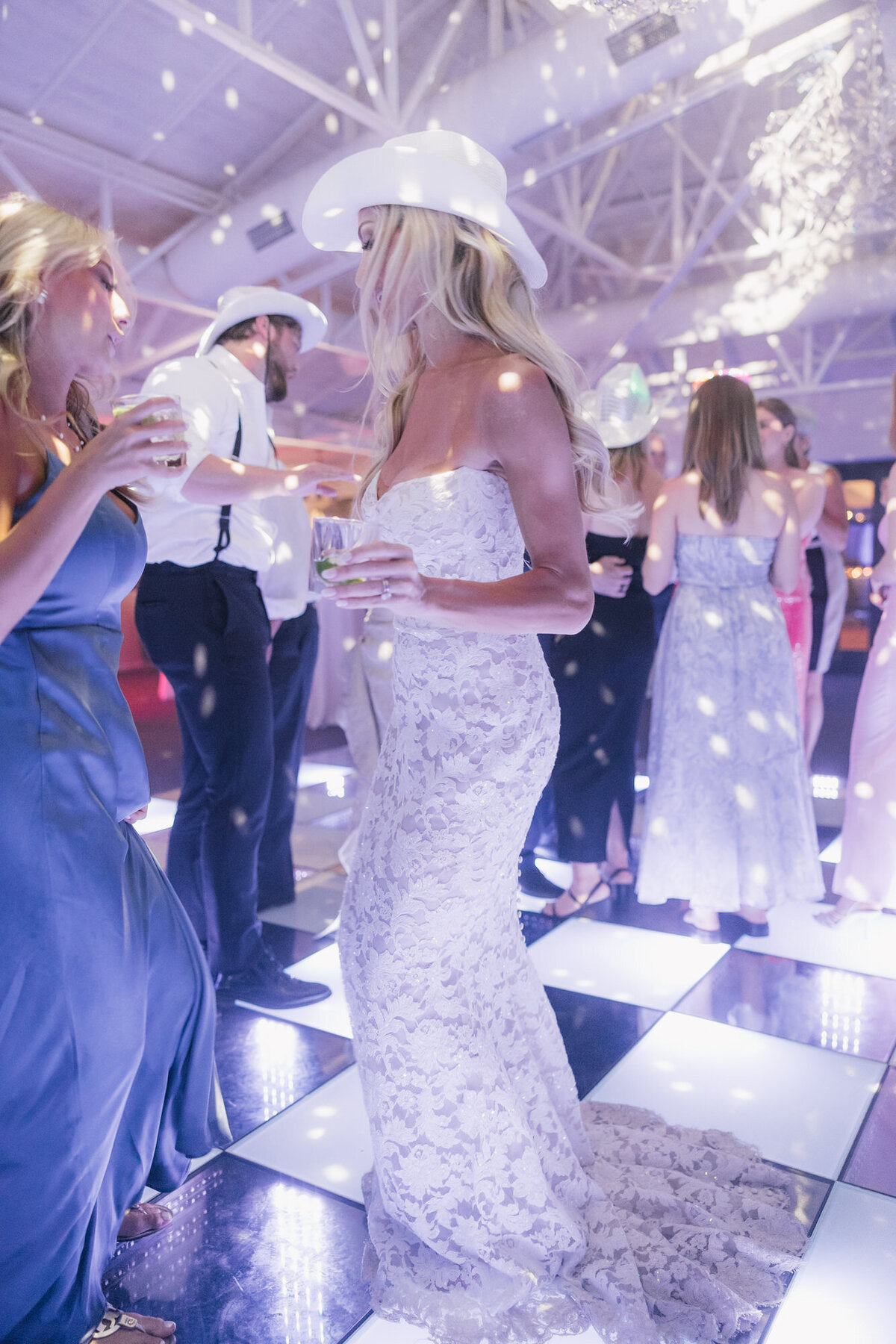 Bride dancing on dance floor at reception at El Chorro