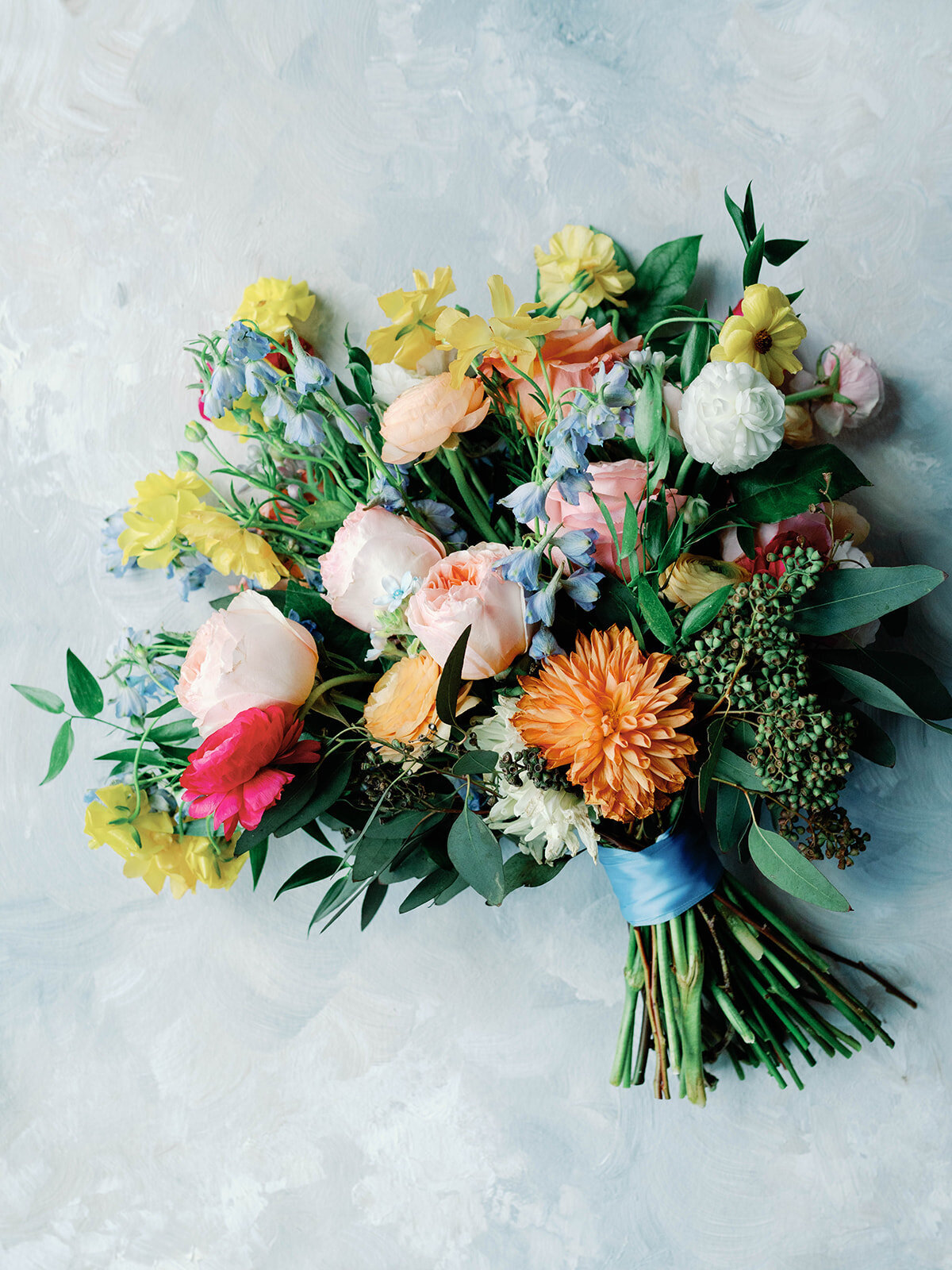 Wedding bouquet that is full and colorful