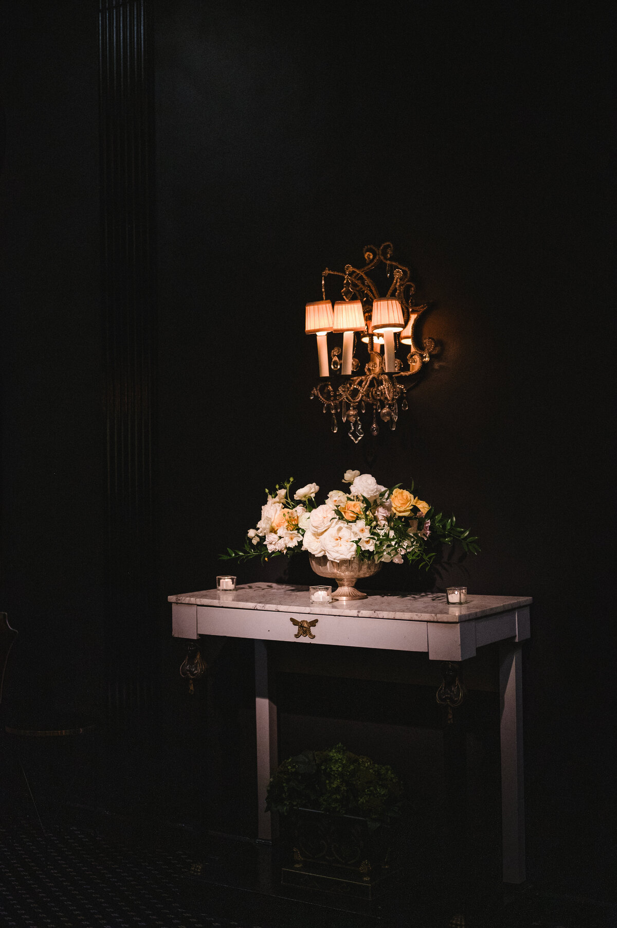 White and Yellow Floral Centerpiece with Candles at Casino Club